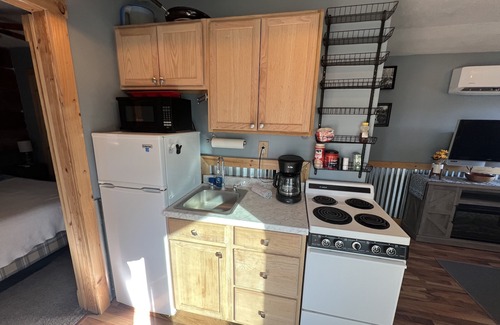 Ellsworth County Cabin | Serene Lake Cabin with Child-Friendly Amenities & 10/10 Rating