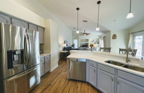 Orange Tree House | Tranquil Lakeside Villa with Pool & Star Wars Games Room