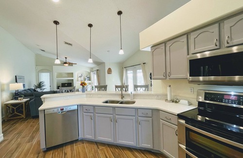 Orange Tree House | Tranquil Lakeside Villa with Pool & Star Wars Games Room