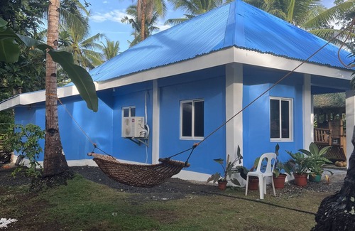Anda House | Tranquil Escape: Beachside Hotel with Refreshing Cave Pool
