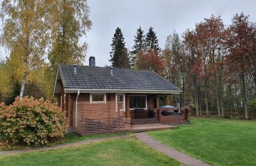 Klaukkala House | Inviting Log Cabin Retreat with Hot Tub & Pet-Friendly Comfort