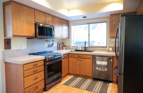 Welches House | Tranquil Mountain Retreat with Pool and Spa Amenities