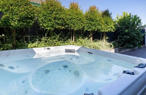 Papamoa Beach House | Tranquil Papamoa Retreat with Relaxing Spa Pool Access