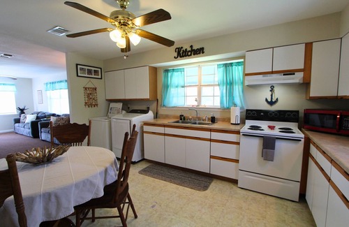 Shoreline Park House | Tranquil Waterfront Retreat with Private Dock & Pool
