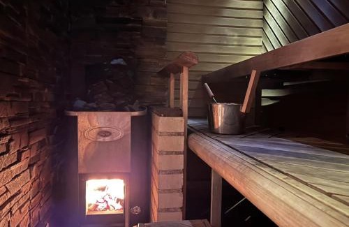Vantaa House | Vantaa Sauna Cottage: Family-Friendly Retreat with Hot Tub
