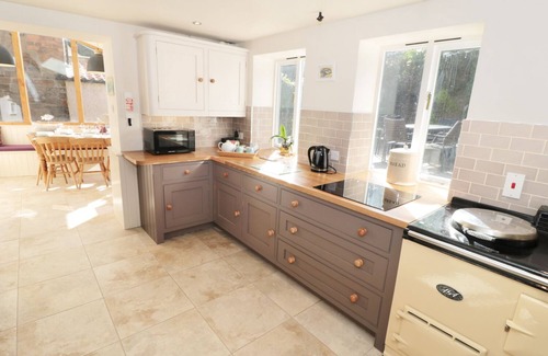 Ruswarp House | Pear Tree House: Oceanfront Retreat with Pet-Friendly Comfort