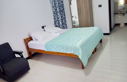 Kotagiri Hotel | Experience Comfort at Pear Tree Inn with Family-Friendly Amenities