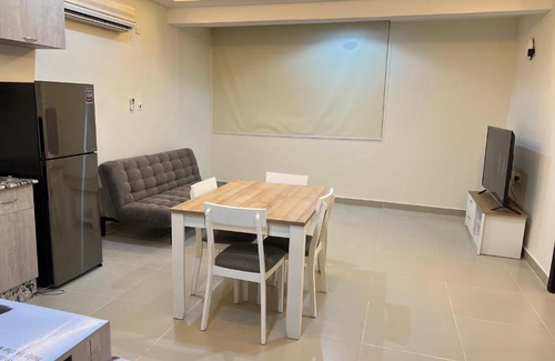 Doha Apartment | Discover Pearl One: Family-Friendly with Kitchen Access