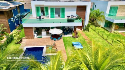 Jenipabu House | Pearly House 5 Suites Close to the Beach in Guarajuba Paradise of the Sea Condominium
