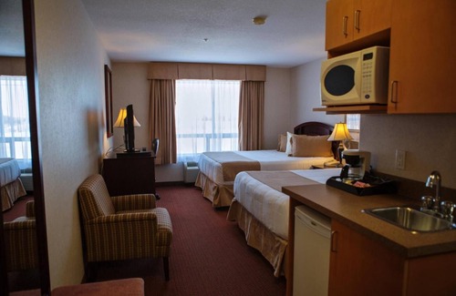 High Prairie Hotel | Inviting Peavine Inn And Suites with Pool and Spa Access