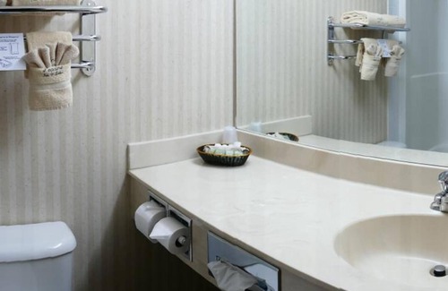 High Prairie Hotel | Inviting Peavine Inn And Suites with Pool and Spa Access