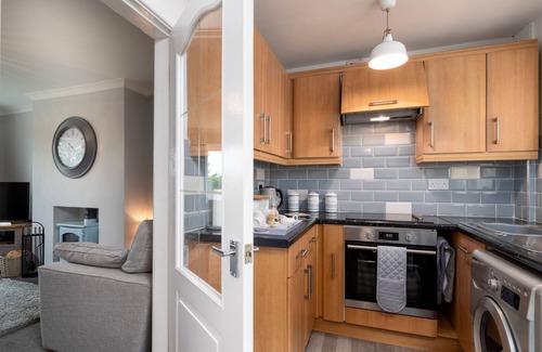 Llanddulas Cottage | Welcoming Pebbles Reach Cottage: Family and Pet-Friendly Stay