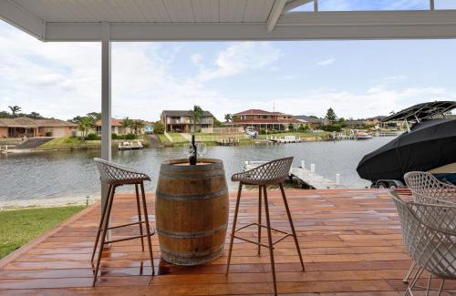 Sussex Inlet House | Pelican Waters: Exceptional 4-Star Stay with Family Amenities