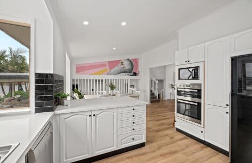 Sussex Inlet House | Pelican Waters: Exceptional 4-Star Stay with Family Amenities