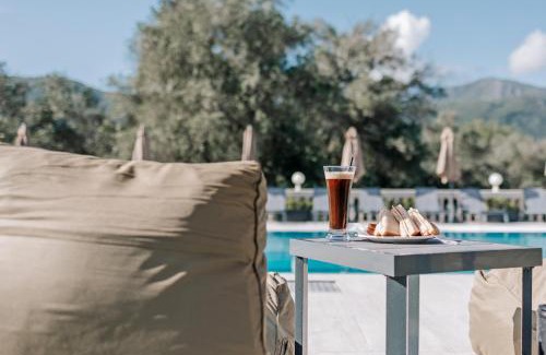 Kato Korakiana Hotel | Family-Friendly Pelithea Aparthotel with Pool & Ocean Views