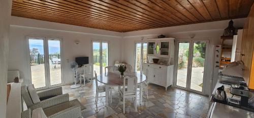 Egira Villa | Seaside Retreat: Peloponnese Hideout with Family-Friendly Perks