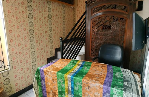 Bogor Hotel | Discover Pemda 22 Mansion Mitra RedDoorz: Family-Friendly Stay