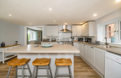 Saint Gennys Cottage | Family-Friendly Penbarden Barn with Cozy Open Fire