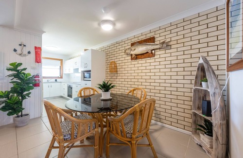 Yamba Apartment | Relax at Peninsula Court 5, Watch Dolphins from Your Room