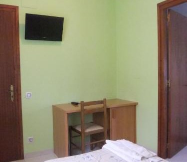 Sant Joan les Fonts House | Welcoming Pensió L'Estada: Pet-Friendly & Family Oriented