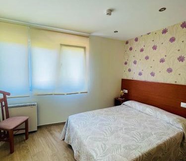 Noia House | Pensión Costiña: Family-Friendly Stay with Breakfast Included