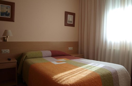 Padron House | Budget-Friendly Pensión HK: Family Dining & Breakfast Included