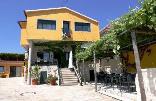 Baiona House | Discover Pensión O Escondidino: 9.2/10 Rated Getaway