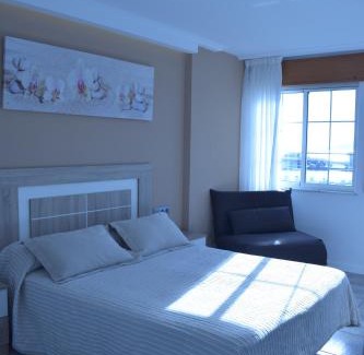 Portosin Hotel | Oceanfront Retreat at Pensión o noso bar with Top Amenities