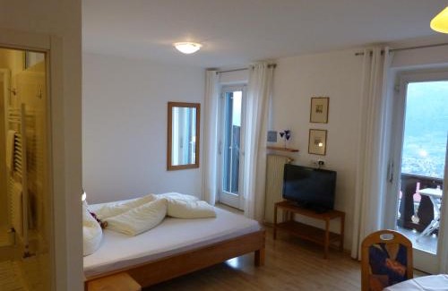 Schenna House | Relax at Pension Chalet Andy: Oceanfront Retreat with Pool