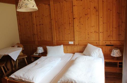 Auffach Hotel | Cozy Pension Luzenberg: Oceanfront Retreat with Pool Access