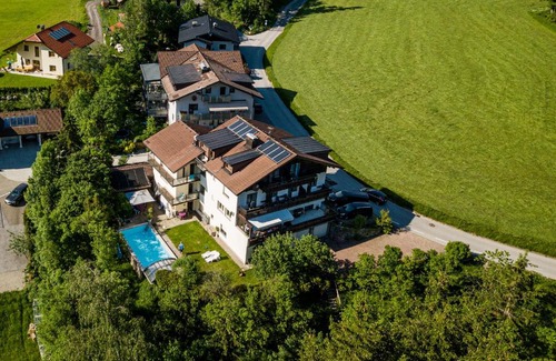 Koppl House | Stunning Pension Nocksteinblick with Oceanfront Pool Access