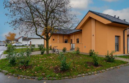 Parndorf House | Discover Pension Pannonia: Family-Friendly with Breakfast