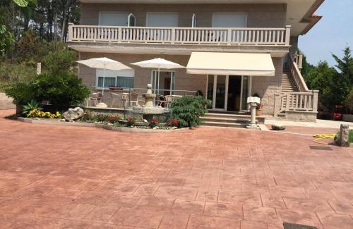 Balea House | Oceanfront Bliss at Pension Playa Mar Cachadiñas