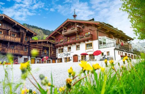 Saalbach-Hinterglemm House | Exceptional Stay at Pension Seighof: Pet-Friendly & More