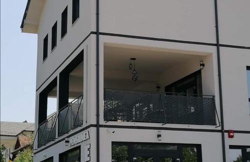 Buzias House | Discover Pensiunea Eli: Family-Friendly with Pool Access