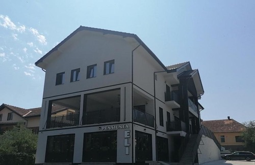 Buzias House | Discover Pensiunea Eli: Family-Friendly with Pool Access