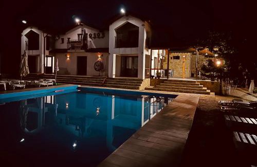 Valea Nucarilor House | Discover Pensiunea Maria: Oceanfront Retreat with Pool