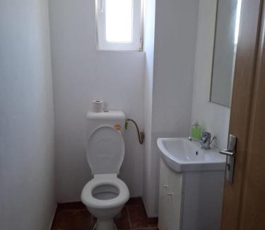 Techirghiol Apartment | Discover Pensiunea Piticilor: 9.4/10 and Oceanfront Bliss