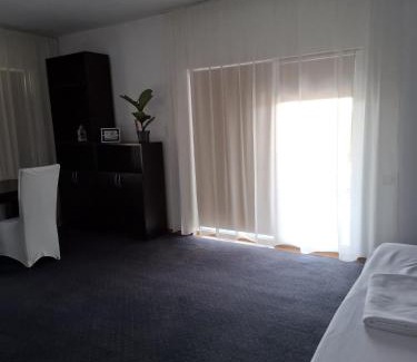 Techirghiol Apartment | Discover Pensiunea Piticilor: 9.4/10 and Oceanfront Bliss