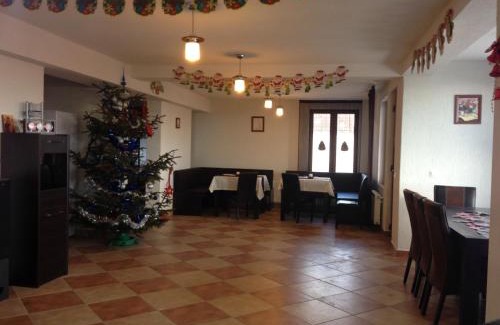 Ranca House | Cozy Pensiunea Roka: Family-Friendly with Hot Tub & More