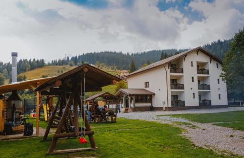 Pojorita House | Discover PENSIUNEA TEOMIR: Family-Friendly Escape