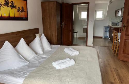 Mikolajki Resort | Relaxing Oceanfront Retreat with Pool and Hot Tub