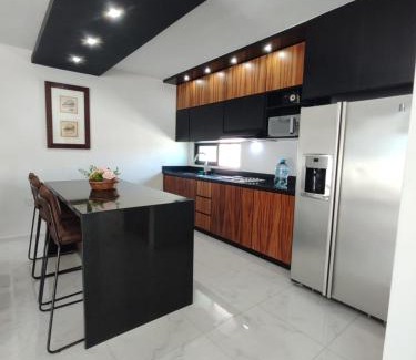 12 de Octubre Apartment | Hookipa Tower: Stunning Penthouse Steps from the Malecón