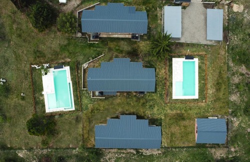 Villa General Belgrano House | Idyllic Pentagrama: Oceanfront Retreat with Pool & Views