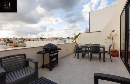 Tal-Ghoqod Apartment | Penthouse and BBQ Kitchen Island & Massive living by 360 Estates