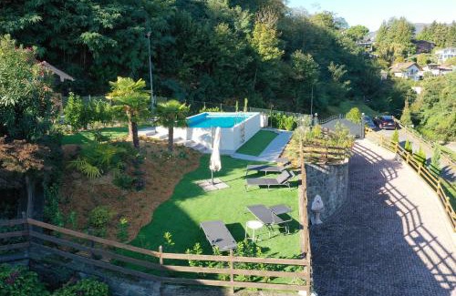 Meina Apartment | Experience Penthouse Andrea: Oceanfront Escape with Pool