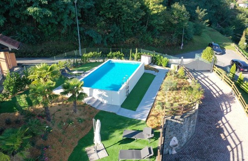 Meina Apartment | Experience Penthouse Andrea: Oceanfront Escape with Pool