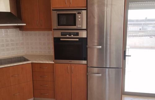 Trikala Apartment | Inviting Penthouse Stay in Trikala with Family Amenities