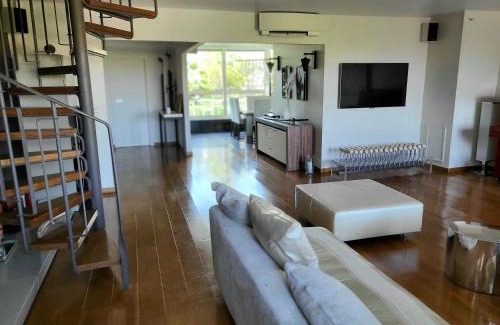 Faubourg-du-Roule Apartment | Elegant Penthouse Champs Élysées with Hot Tub & Top Ratings