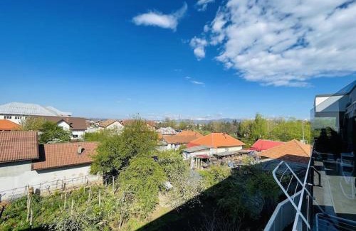 Tirgu Jiu Apartment | Elegant Penthouse Coloana Infinitului for Family Getaways